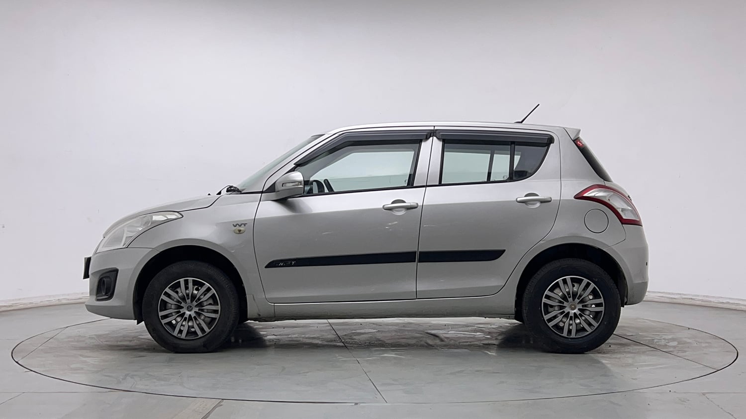 Used 2016 Maruti Suzuki Swift Lxi (O) Petrol Manual exterior LEFT SIDE VIEW