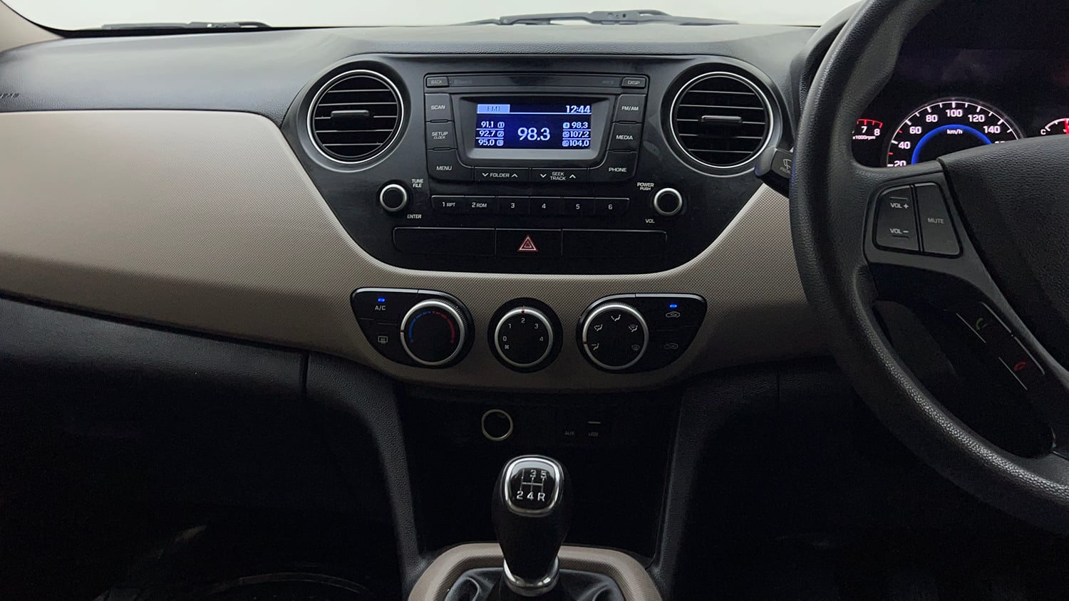 Used 2016 Hyundai Grand i10 Sportz 1.2 Kappa VTVT Petrol Manual interior MUSIC SYSTEM & AC CONTROL VIEW