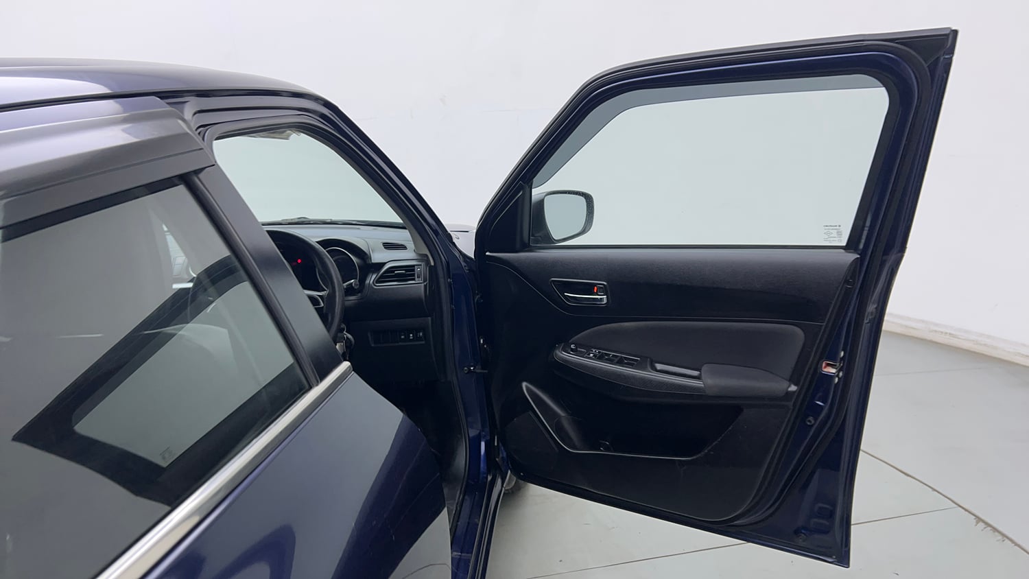 Used 2023 Maruti Suzuki Swift VXi Petrol Manual interior RIGHT FRONT DOOR OPEN VIEW