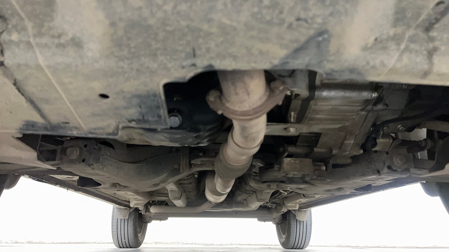Used 2024 Tata Nexon Creative 1.2 Revotron Petrol 6AMT DT Petrol Automatic extra FRONT LEFT UNDERBODY VIEW