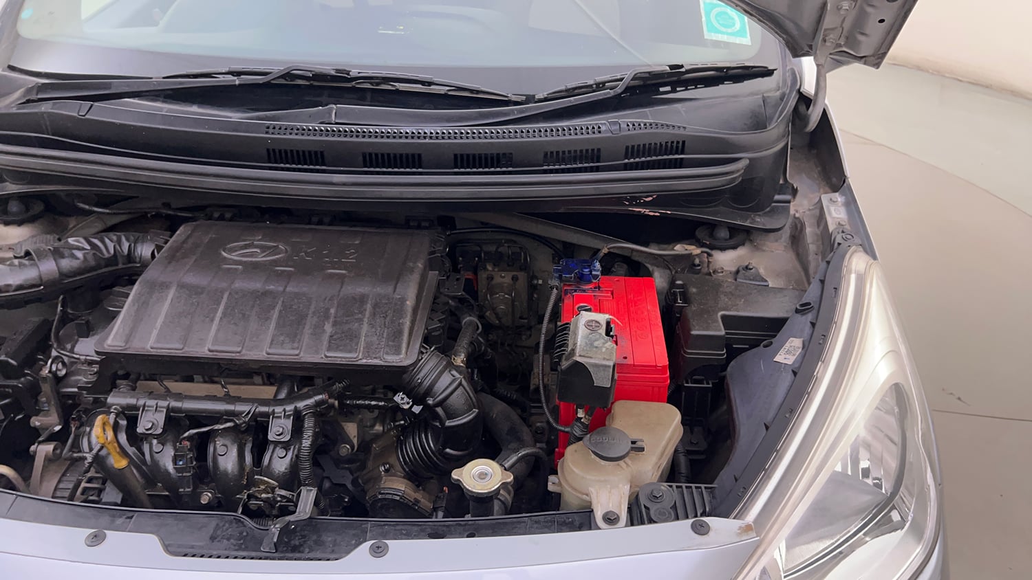 Used 2019 Hyundai Grand i10 Sportz 1.2 Kappa VTVT Petrol Manual engine ENGINE LEFT SIDE HINGE & APRON VIEW