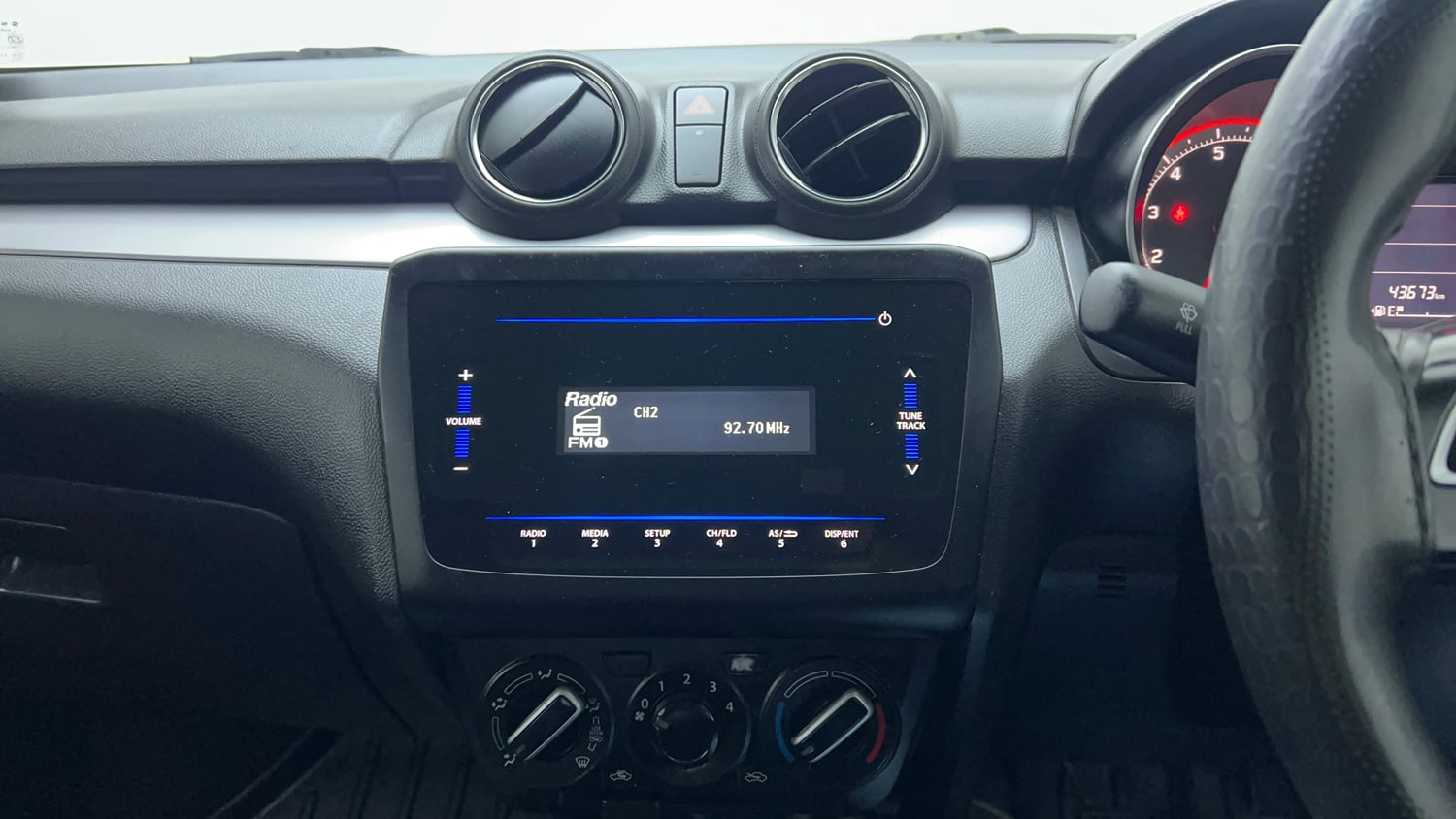 Used 2023 Maruti Suzuki Swift VXi Petrol Manual top_features Integrated (in-dash) music system