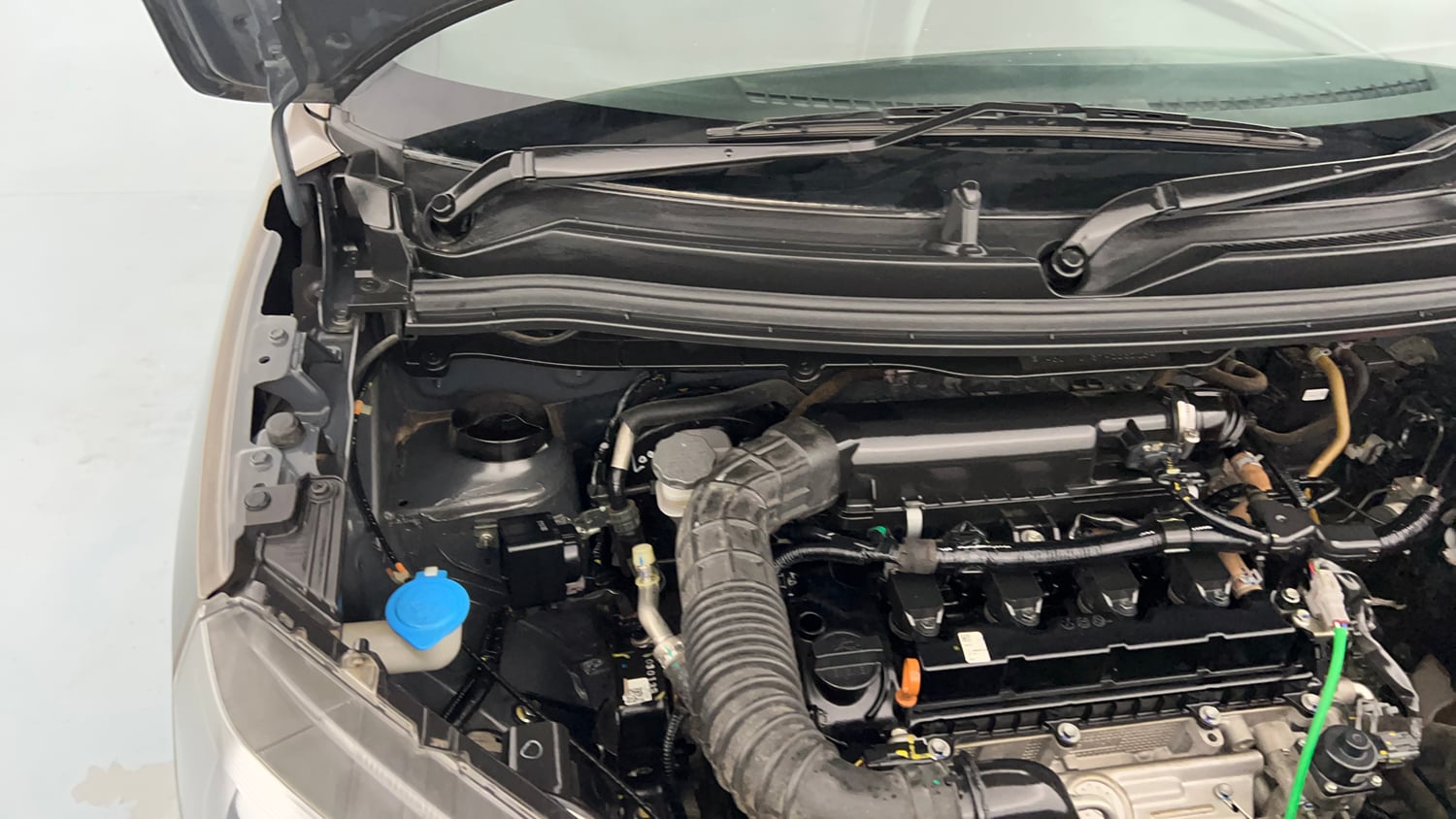 Used 2023 Maruti Suzuki Wagon R ZXI Plus 1.2 Petrol Manual engine ENGINE RIGHT SIDE HINGE & APRON VIEW