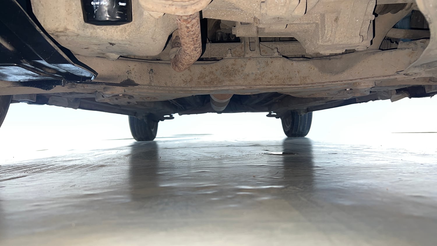 Used 2015 Maruti Suzuki Swift Dzire ZXI Petrol Manual extra FRONT LEFT UNDERBODY VIEW