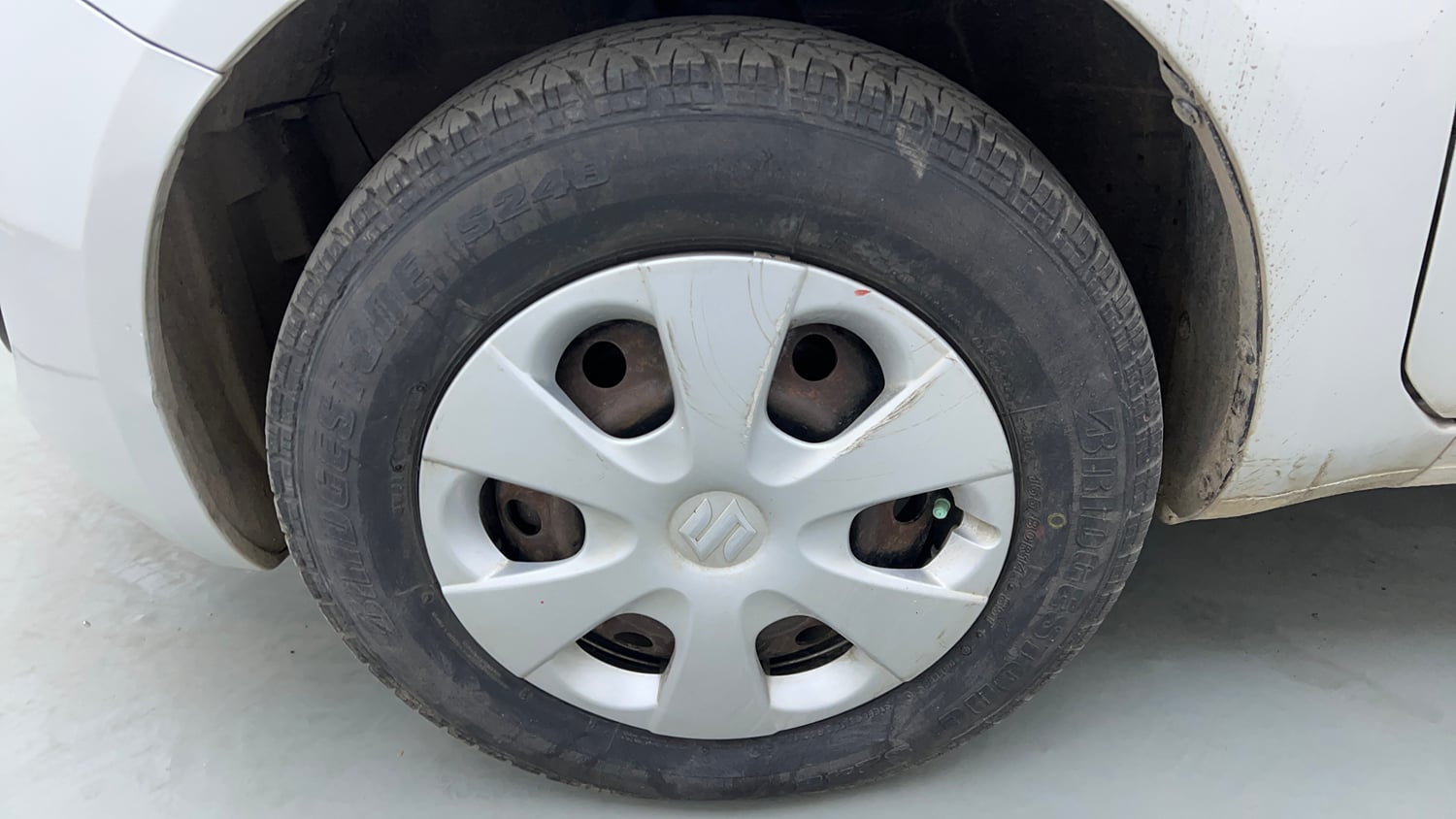 Used 2014 Maruti Suzuki Ritz Vxi BS-IV Petrol Manual tyres LEFT FRONT TYRE RIM VIEW