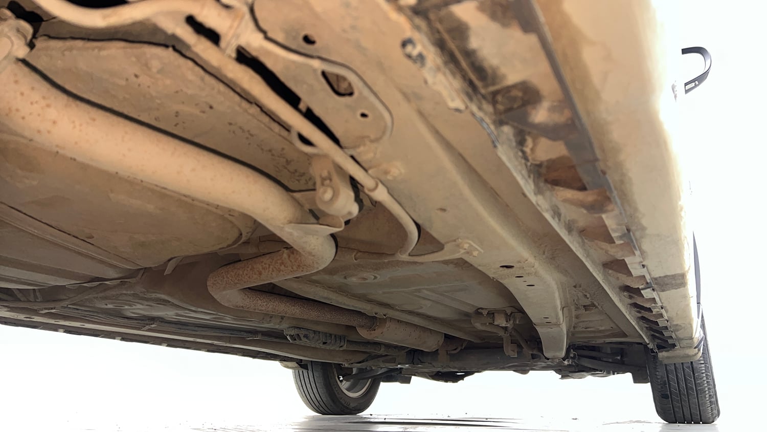 Used 2023 Maruti Suzuki XL6 Zeta MT Petrol Petrol Manual extra REAR RIGHT UNDERBODY VIEW