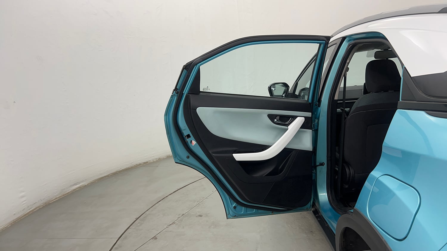 Used 2024 Tata Nexon Creative 1.2 Revotron Petrol 6AMT DT Petrol Automatic interior LEFT REAR DOOR OPEN VIEW