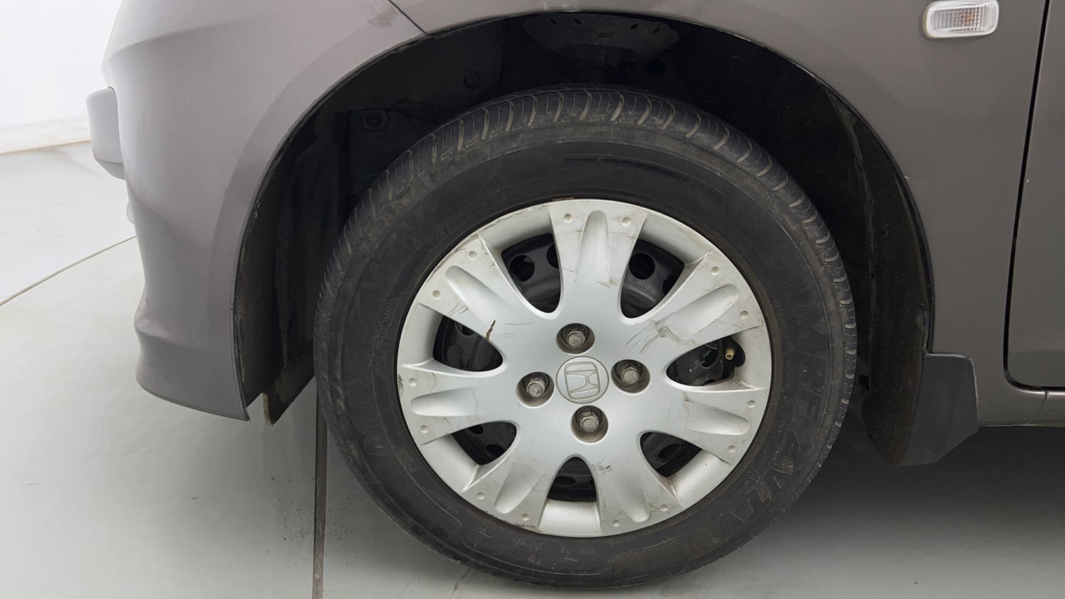 Used 2016 Honda Amaze 1.2 S i-VTEC Petrol Manual tyres LEFT FRONT TYRE RIM VIEW