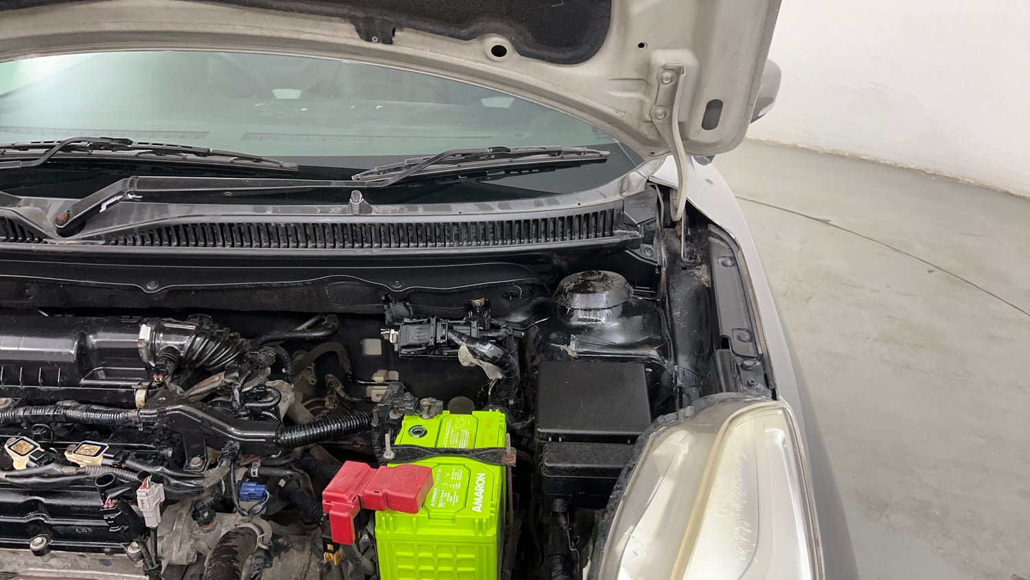 Used 2015 Maruti Suzuki Baleno Zeta 1.2 Petrol Manual engine ENGINE LEFT SIDE HINGE & APRON VIEW