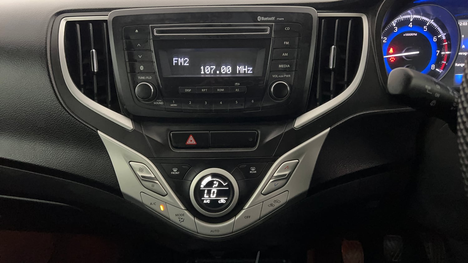 Used 2018 Maruti Suzuki Baleno Zeta 1.2 Petrol Manual interior MUSIC SYSTEM & AC CONTROL VIEW