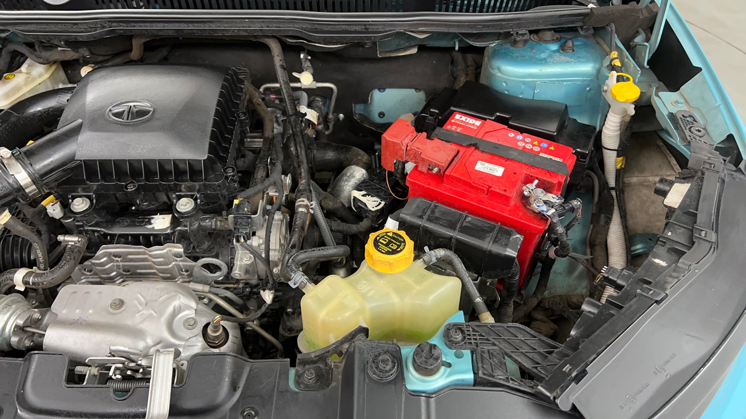 Used 2024 Tata Nexon Creative 1.2 Revotron Petrol 6AMT DT Petrol Automatic engine ENGINE LEFT SIDE VIEW