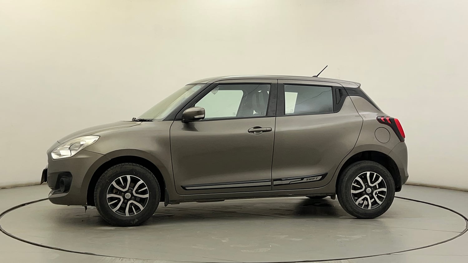 Used 2022 Maruti Suzuki Swift VXi Petrol Manual exterior LEFT SIDE VIEW