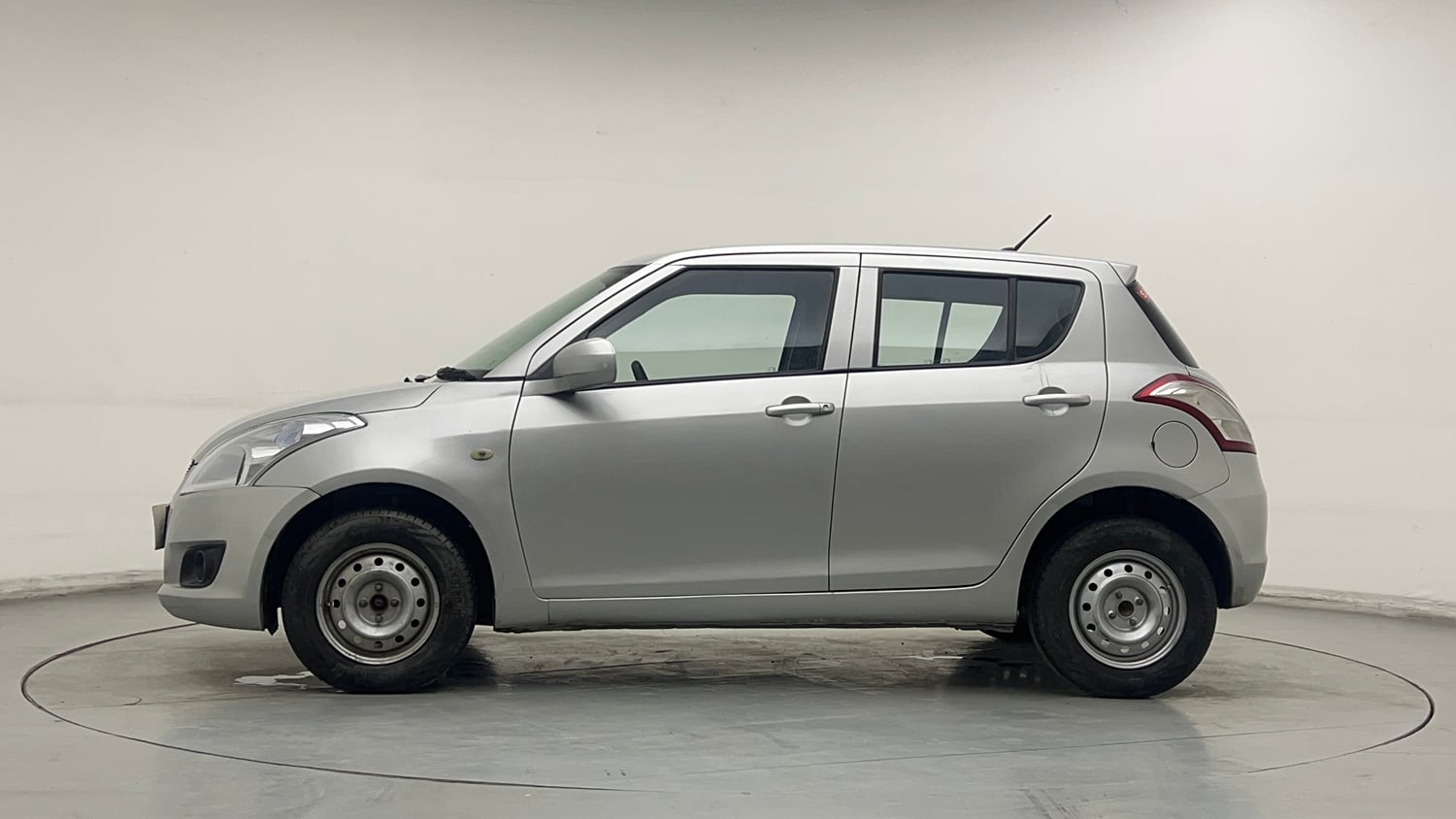Used 2014 Maruti Suzuki Swift LXi Petrol Manual exterior LEFT SIDE VIEW