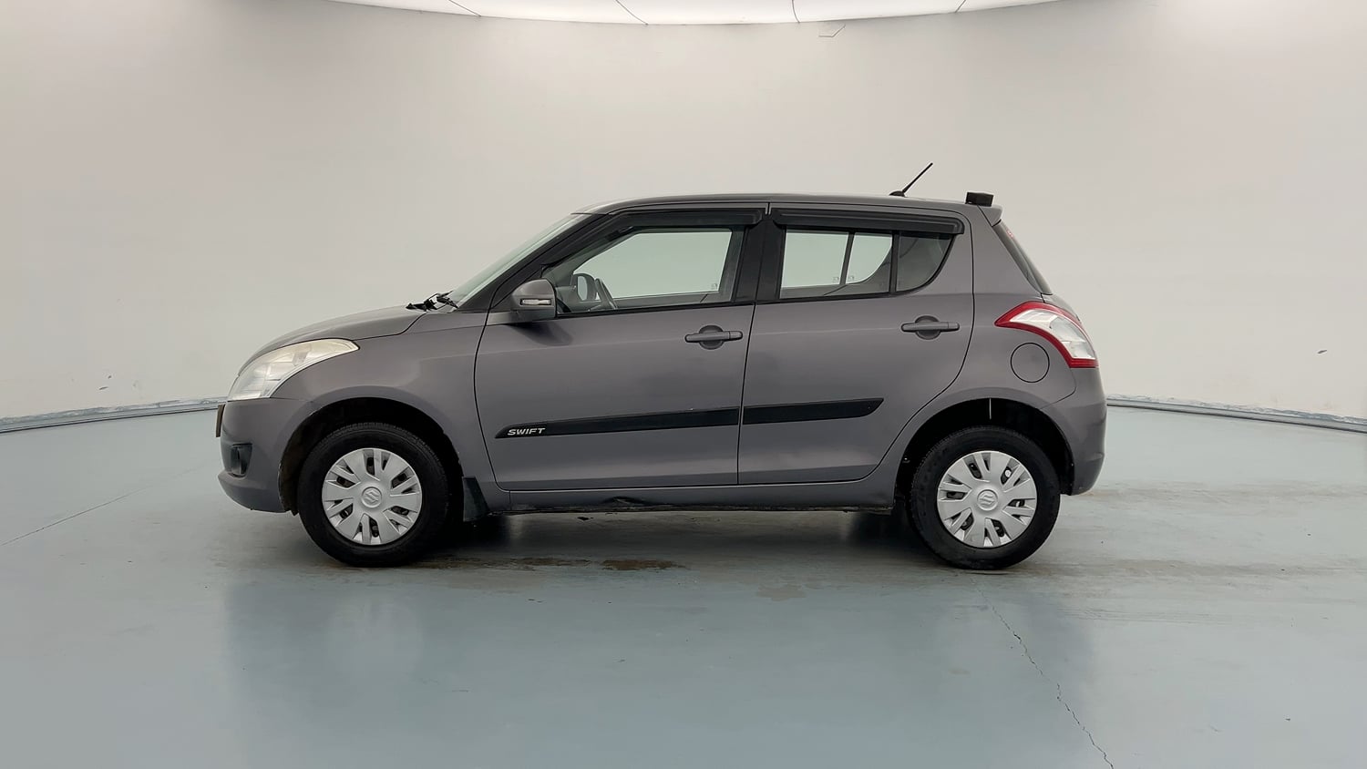 Used 2013 Maruti Suzuki Swift VXi Petrol Manual exterior LEFT SIDE VIEW