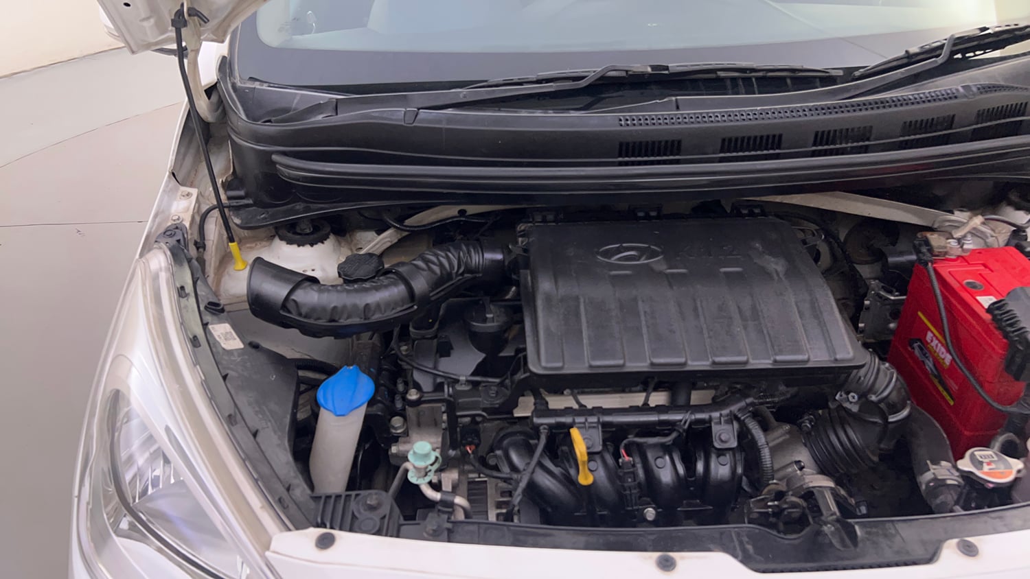 Used 2019 Hyundai Grand i10 Sportz 1.2 Kappa VTVT Petrol Manual engine ENGINE RIGHT SIDE HINGE & APRON VIEW
