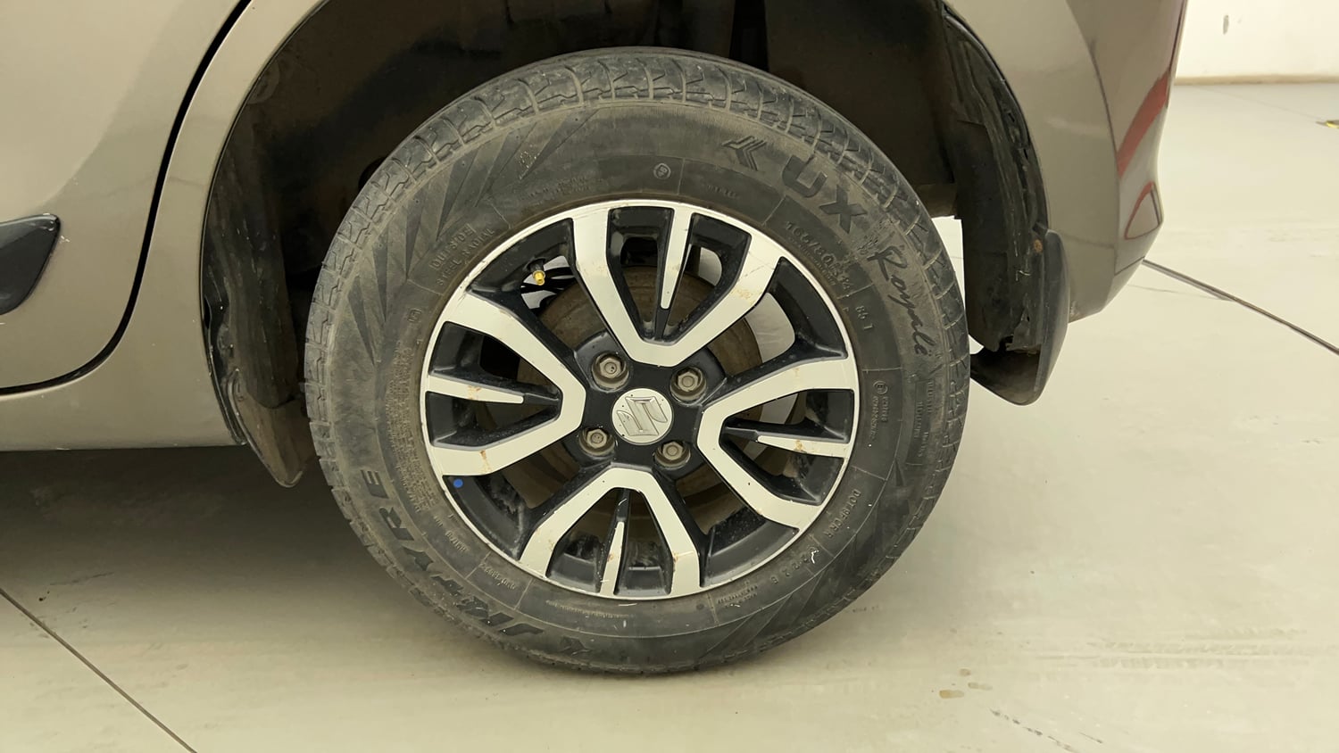 Used 2022 Maruti Suzuki Swift VXi Petrol Manual tyres LEFT REAR TYRE RIM VIEW