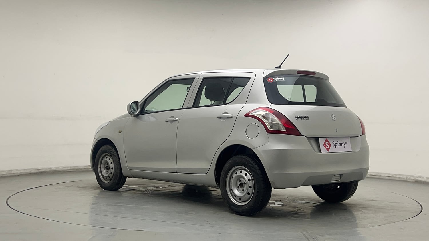 Used 2014 Maruti Suzuki Swift LXi Petrol Manual exterior LEFT REAR CORNER VIEW
