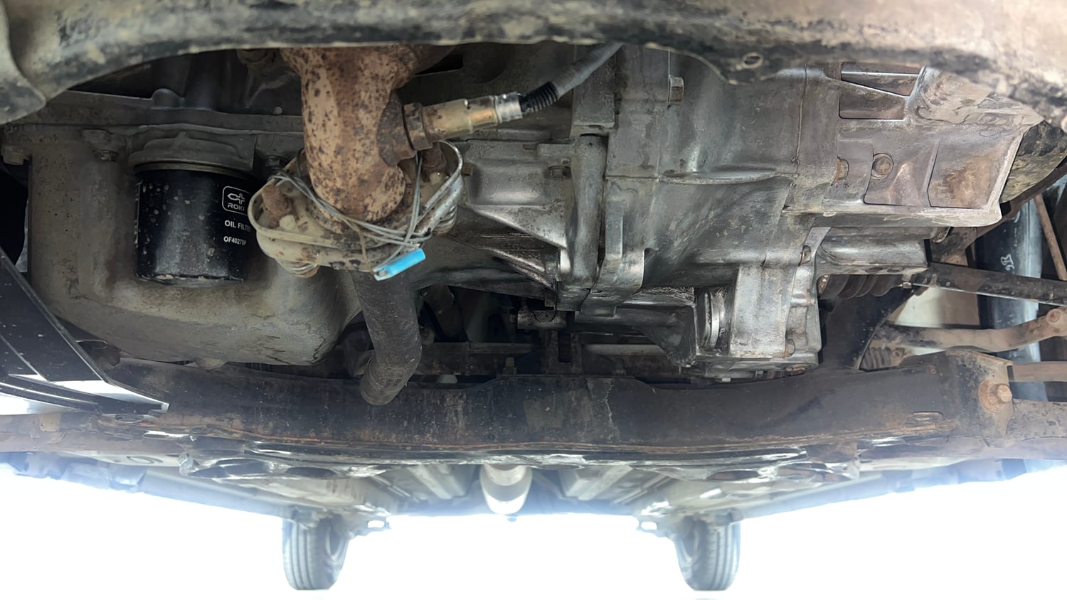 Used 2014 Maruti Suzuki Swift LXi Petrol Manual extra FRONT LEFT UNDERBODY VIEW