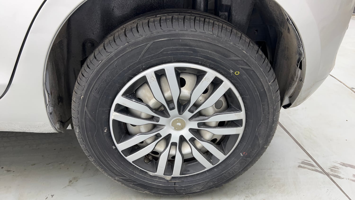 Used 2016 Maruti Suzuki Swift Lxi (O) Petrol Manual tyres LEFT REAR TYRE RIM VIEW