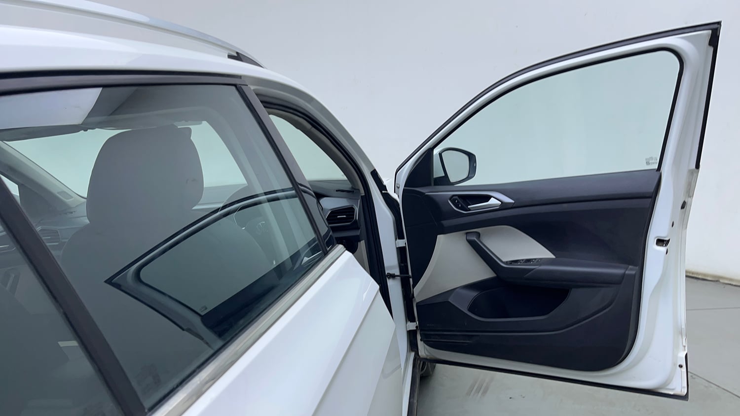 Used 2023 Volkswagen Taigun Topline 1.0 TSI AT Petrol Automatic interior RIGHT FRONT DOOR OPEN VIEW