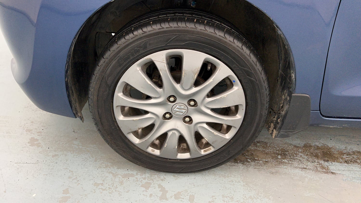 Used 2018 Maruti Suzuki Baleno Zeta 1.2 Petrol Manual tyres LEFT FRONT TYRE RIM VIEW