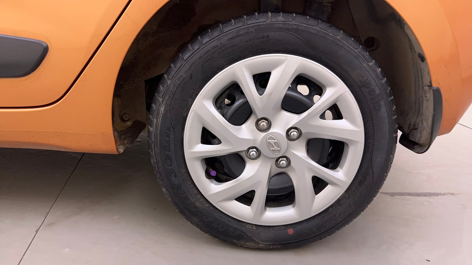 Used 2017 Hyundai Grand i10 Sportz (O) 1.2 Kappa VTVT Petrol Manual tyres LEFT REAR TYRE RIM VIEW