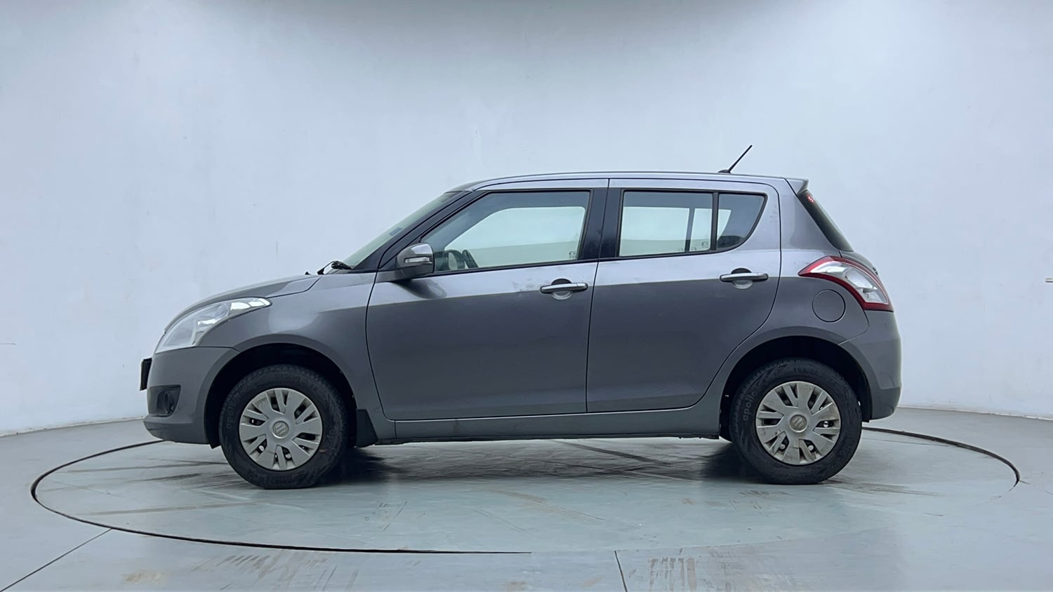 Used 2014 Maruti Suzuki Swift VXi Petrol Manual exterior LEFT SIDE VIEW