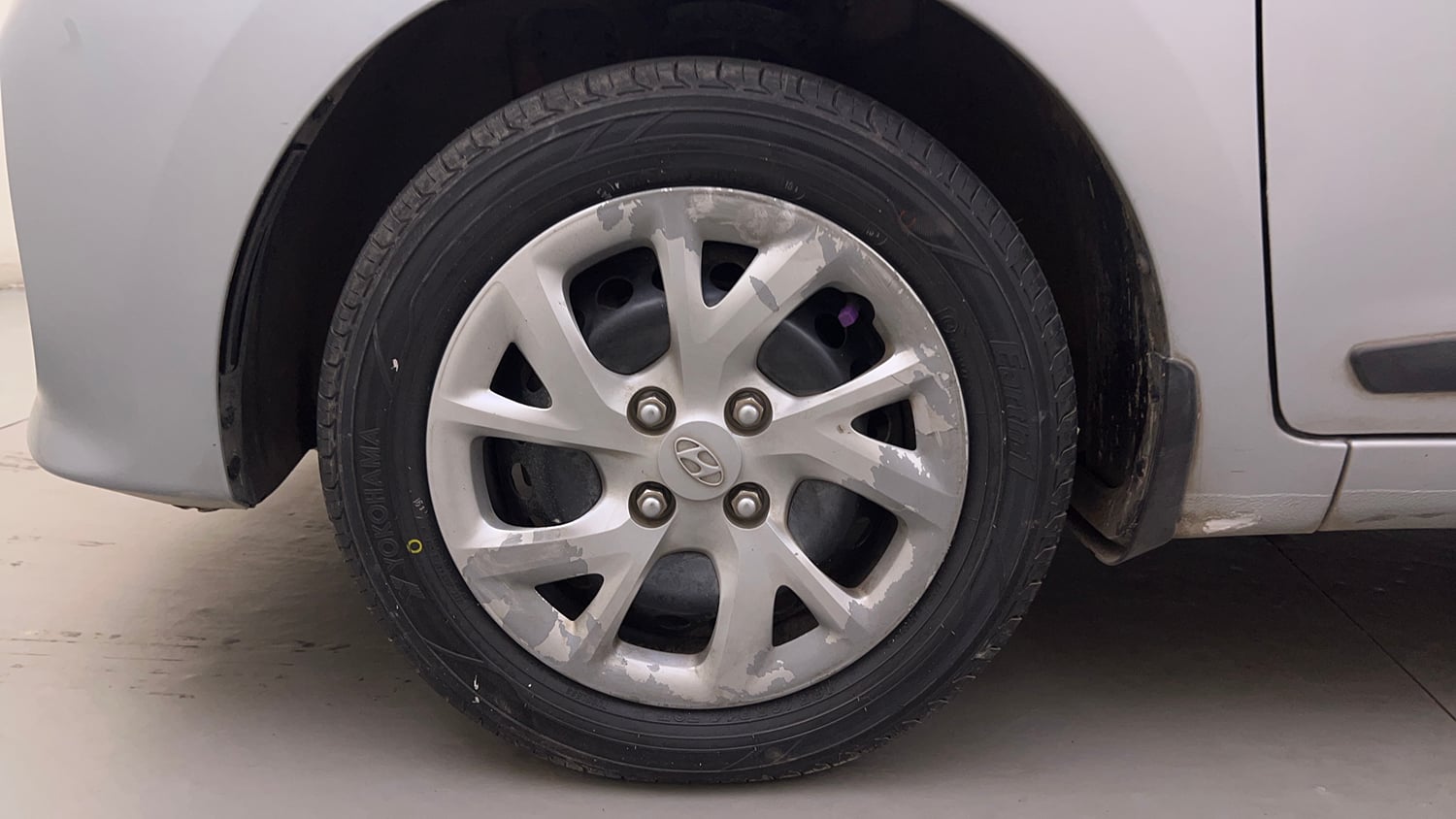 Used 2019 Hyundai Grand i10 Sportz 1.2 Kappa VTVT Petrol Manual tyres LEFT FRONT TYRE RIM VIEW
