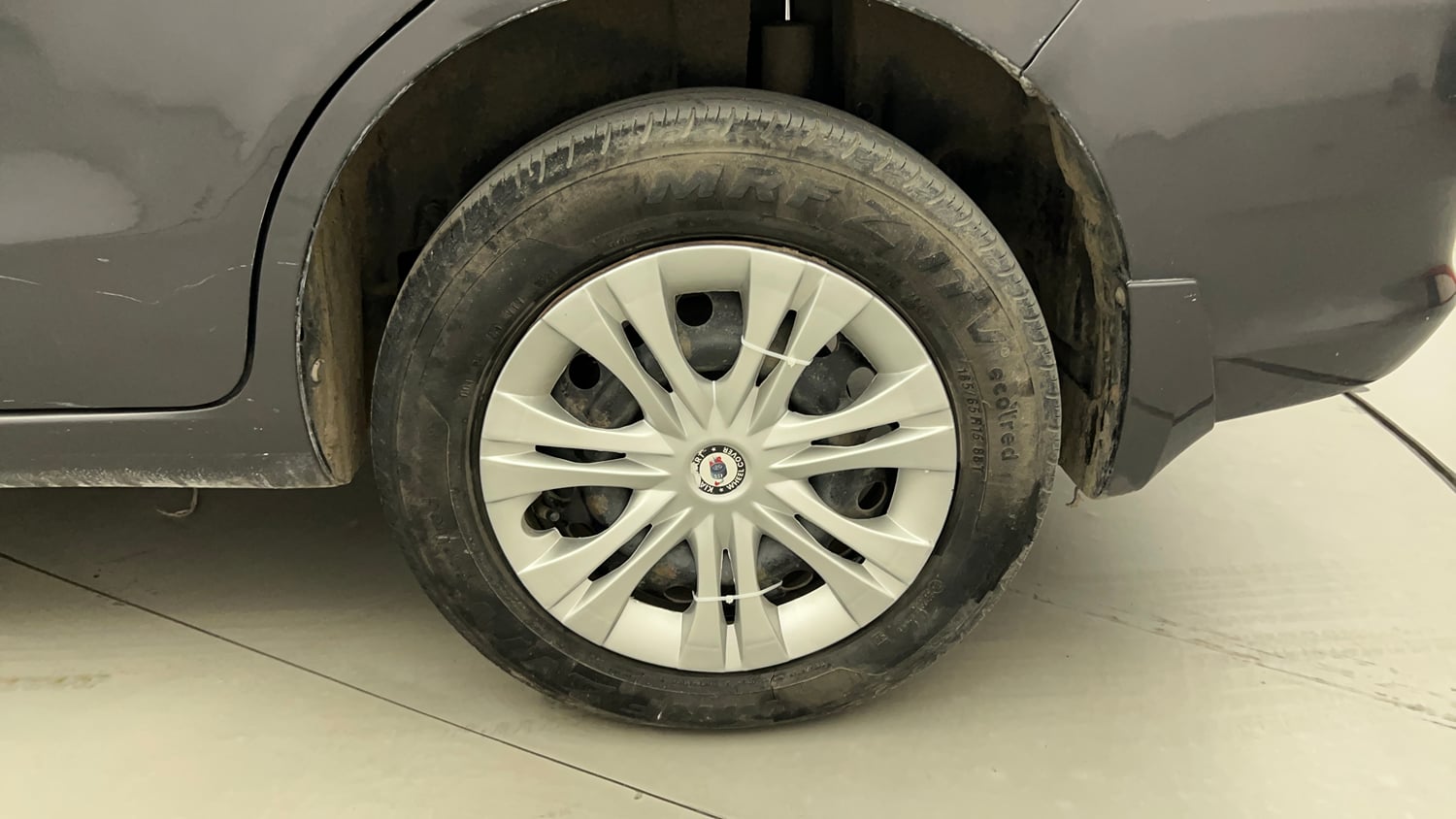Used 2015 Maruti Suzuki Ertiga VXI CNG (Outside Fitted) Cng Manual tyres LEFT REAR TYRE RIM VIEW