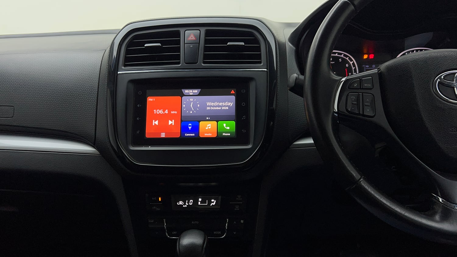 Used 2020 Toyota Urban Cruiser Premium Grade AT Dual Tone Petrol Automatic interior MUSIC SYSTEM & AC CONTROL VIEW