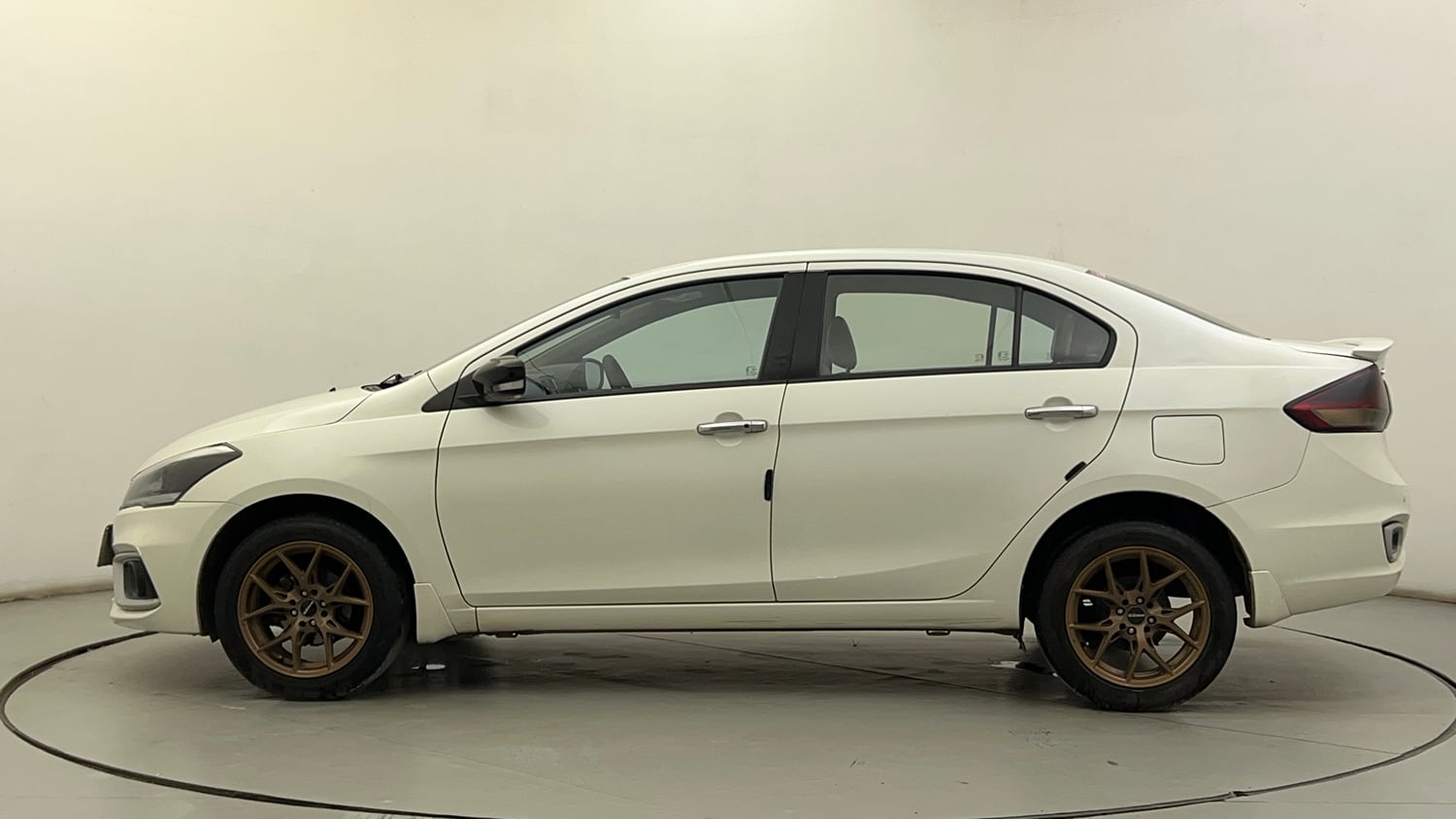 Used 2022 Maruti Suzuki Ciaz Zeta 1.5 Petrol Manual exterior LEFT SIDE VIEW