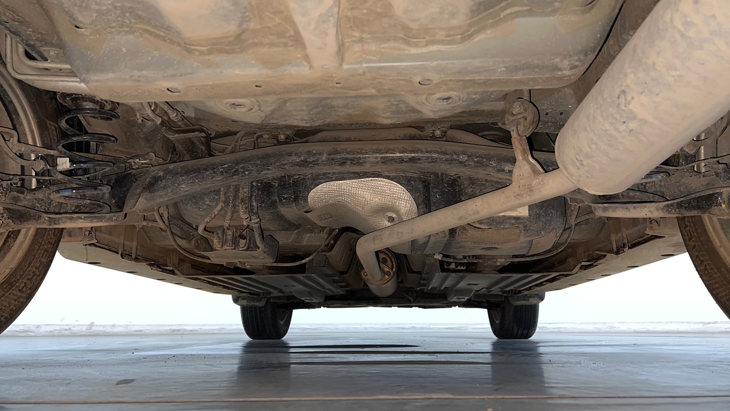 Used 2023 Toyota Urban Cruiser Hyryder V AT NeoDrive Petrol Automatic extra REAR UNDERBODY VIEW (TAKEN FROM REAR)
