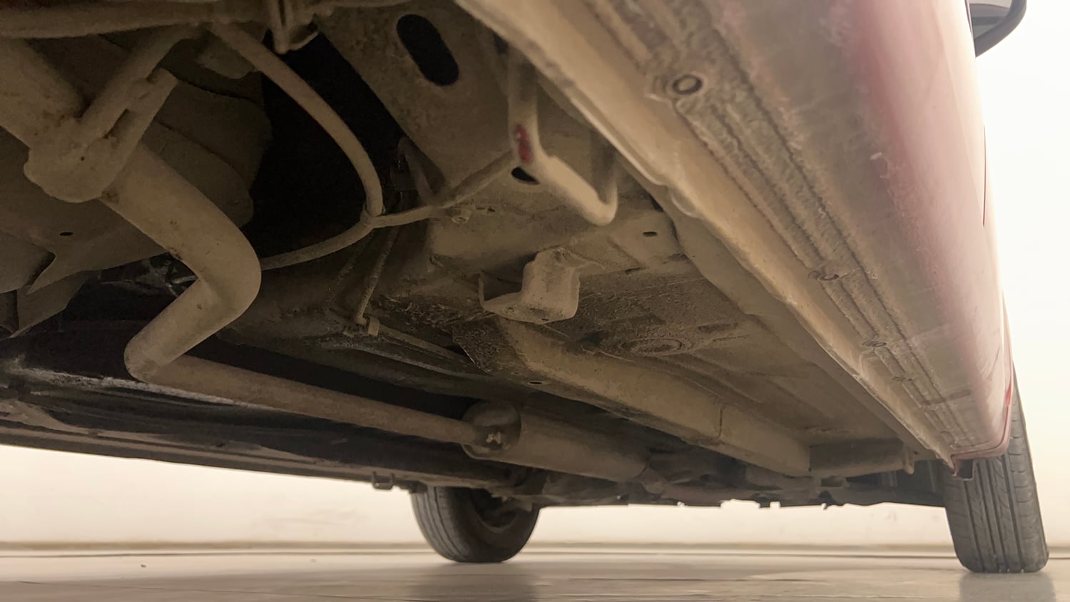 Used 2014 Maruti Suzuki Celerio VXi AMT Petrol Automatic extra REAR RIGHT UNDERBODY VIEW
