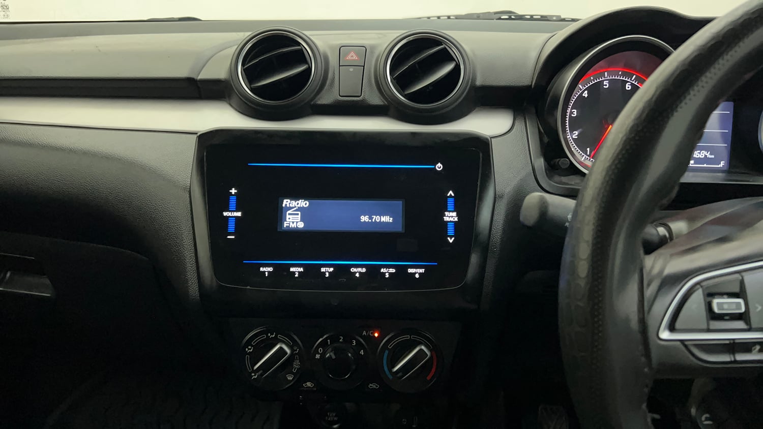 Used 2022 Maruti Suzuki Swift VXi Petrol Manual interior MUSIC SYSTEM & AC CONTROL VIEW