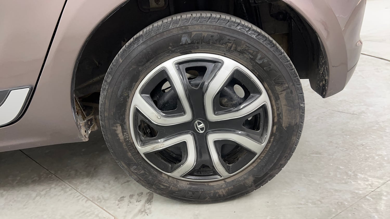 Used 2018 Tata Tiago Revotron XT Petrol Manual tyres LEFT REAR TYRE RIM VIEW