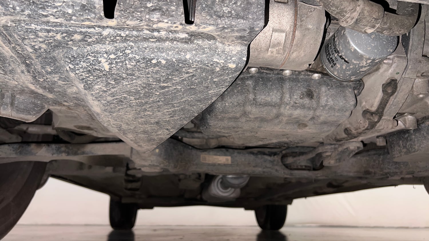 Used 2022 Volkswagen Taigun Topline 1.0 TSI AT Petrol Automatic extra FRONT LEFT UNDERBODY VIEW