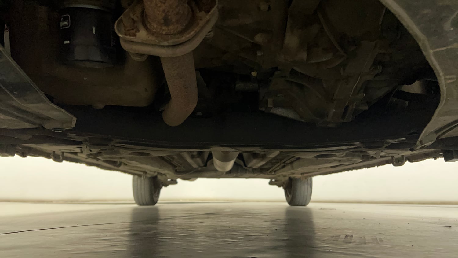Used 2015 Maruti Suzuki Ertiga VXI CNG (Outside Fitted) Cng Manual extra FRONT LEFT UNDERBODY VIEW