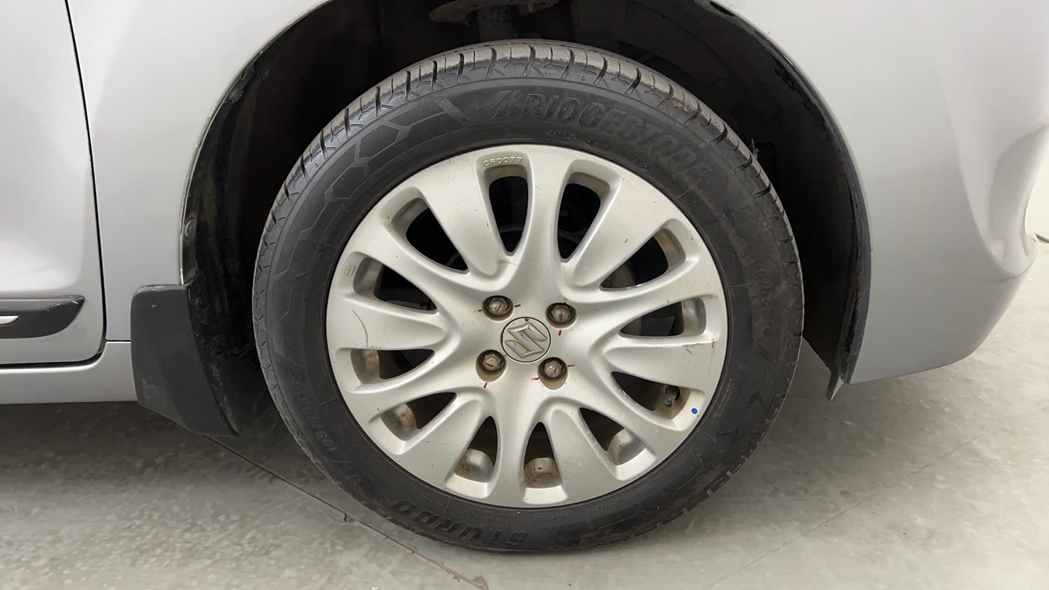 Used 2015 Maruti Suzuki Baleno Zeta 1.2 Petrol Manual tyres RIGHT FRONT TYRE RIM VIEW