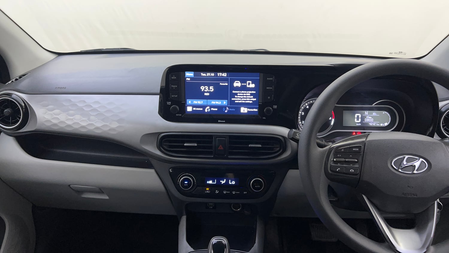 Used 2021 Hyundai Grand i10 Nios Sportz AMT 1.2 Kappa VTVT Petrol Automatic interior MUSIC SYSTEM & AC CONTROL VIEW