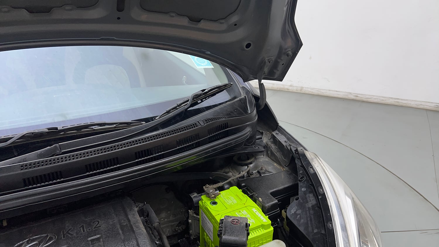 Used 2016 Hyundai Grand i10 Sportz 1.2 Kappa VTVT Petrol Manual engine ENGINE LEFT SIDE HINGE & APRON VIEW