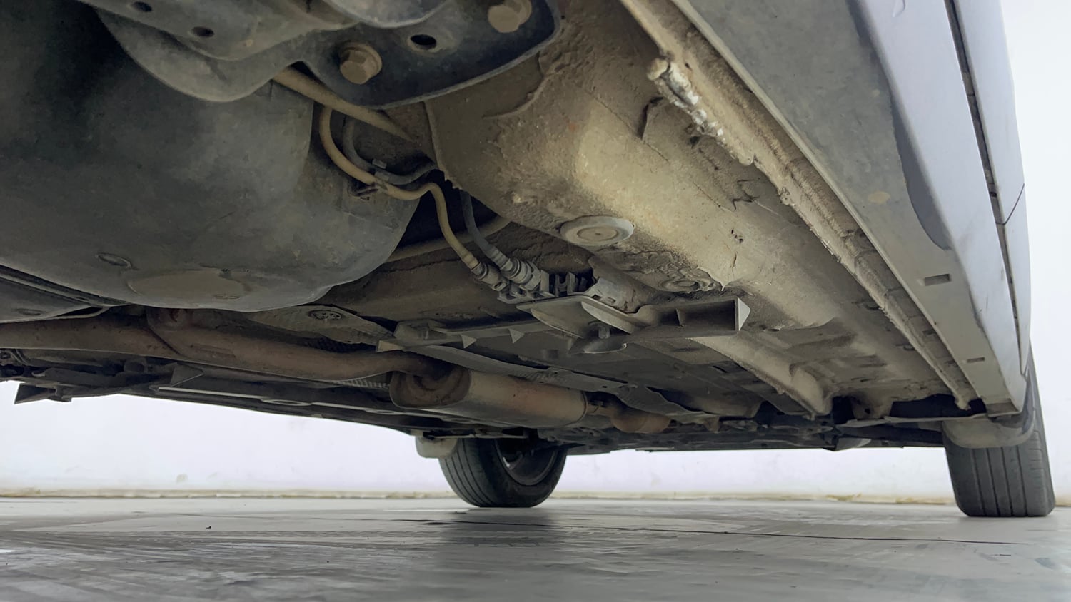 Used 2023 Volkswagen Taigun Topline 1.0 TSI AT Petrol Automatic extra REAR RIGHT UNDERBODY VIEW
