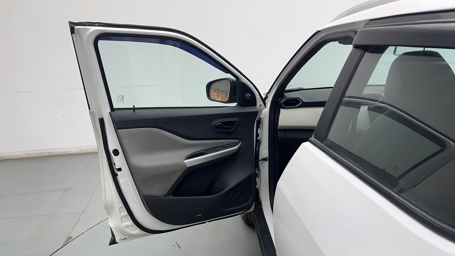 Used 2023 Nissan Magnite XE Petrol Manual interior LEFT FRONT DOOR OPEN VIEW