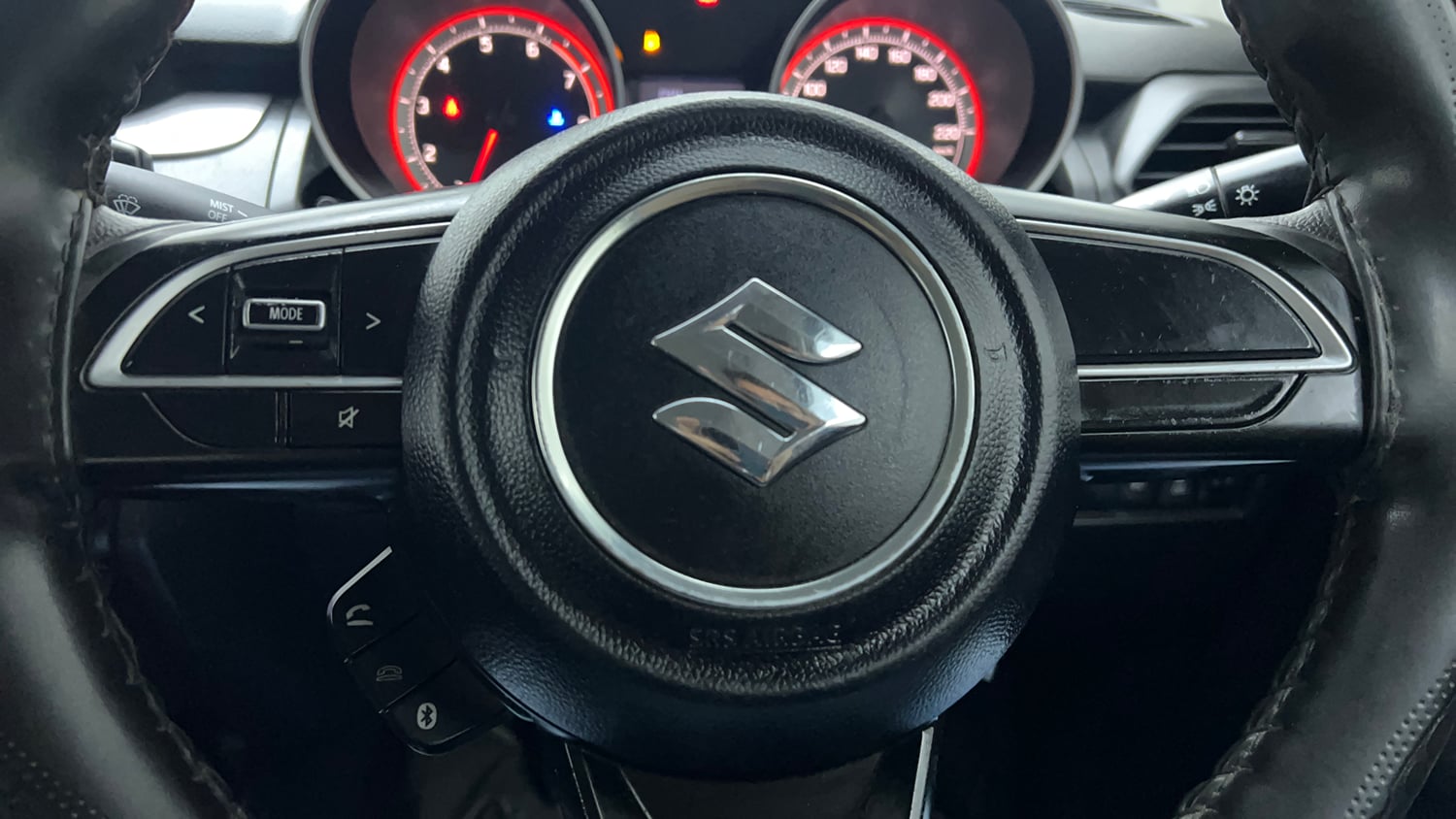Used 2023 Maruti Suzuki Swift VXi Petrol Manual top_features Steering mounted controls