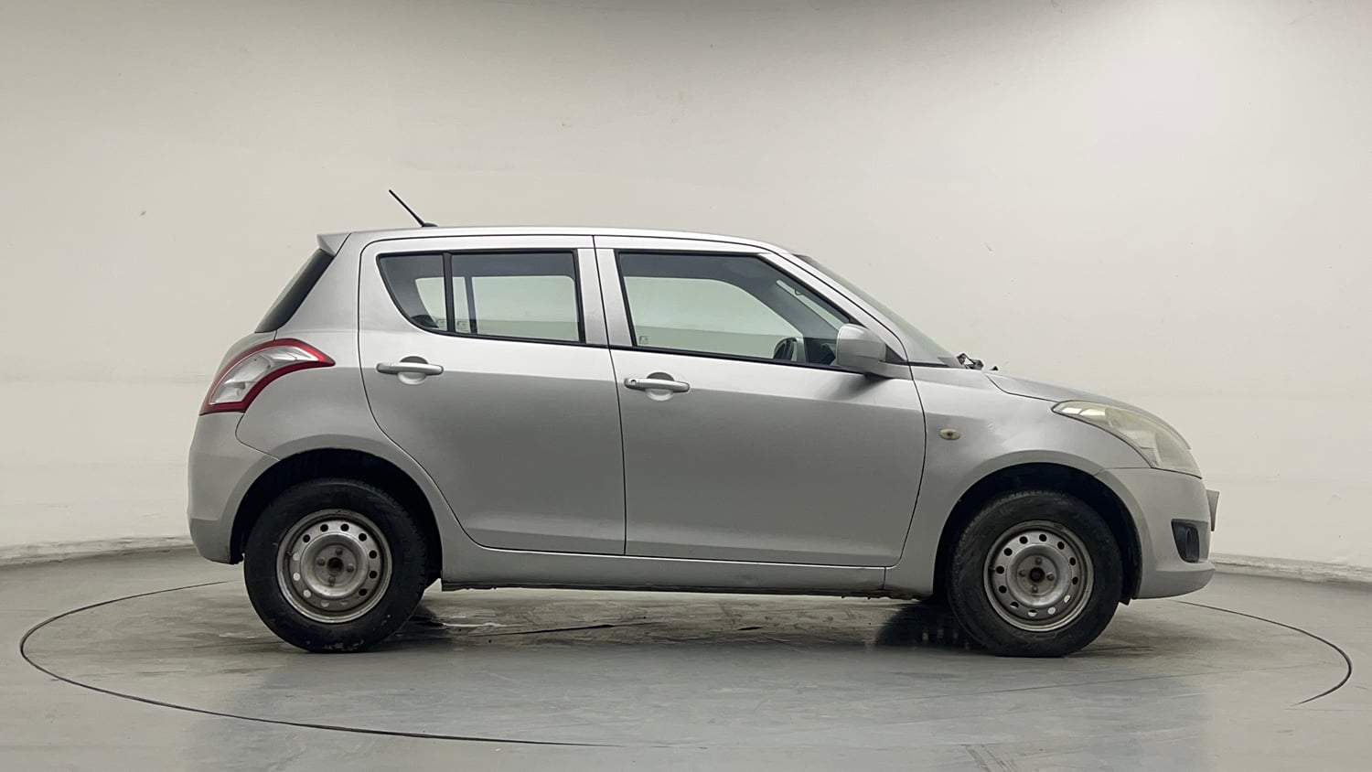 Used 2014 Maruti Suzuki Swift LXi Petrol Manual exterior RIGHT SIDE VIEW