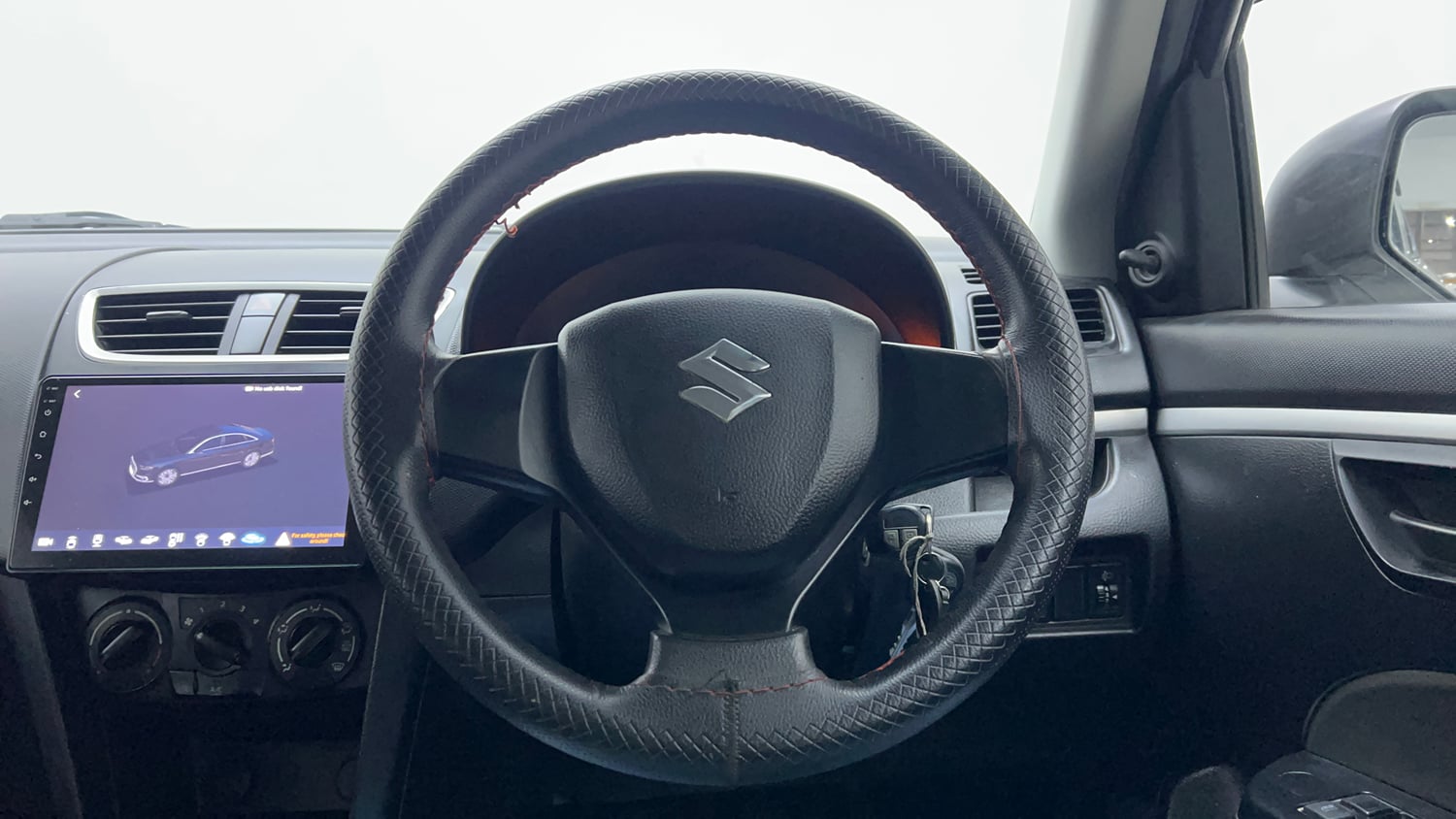 Used 2016 Maruti Suzuki Swift Lxi (O) Petrol Manual interior STEERING VIEW