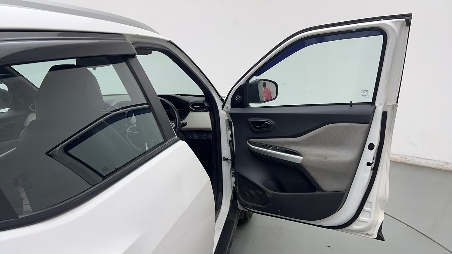Used 2023 Nissan Magnite XE Petrol Manual interior RIGHT FRONT DOOR OPEN VIEW