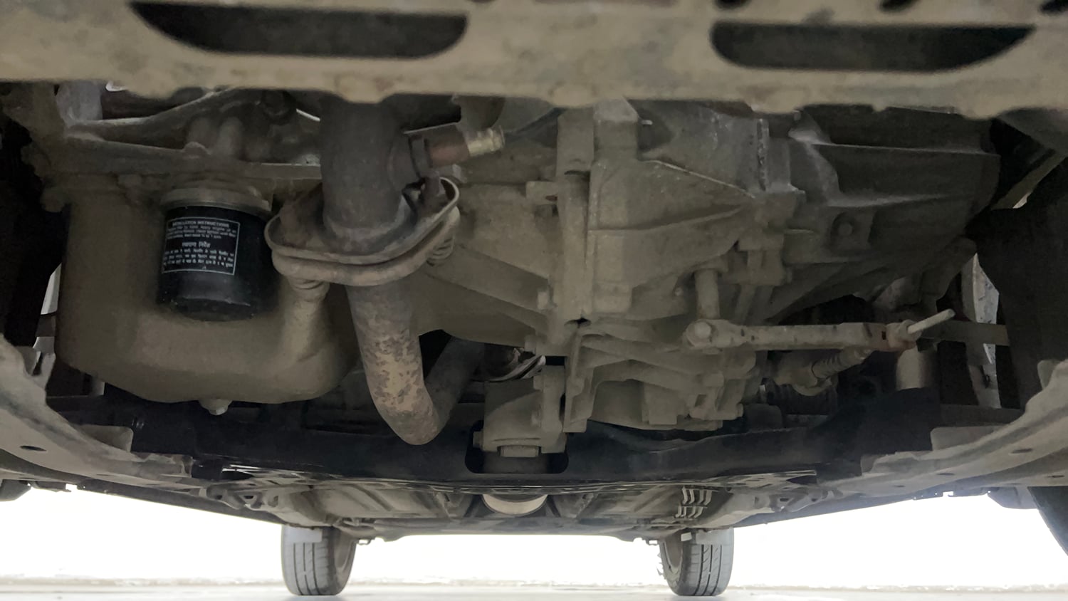 Used 2015 Maruti Suzuki Baleno Zeta 1.2 Petrol Manual extra FRONT LEFT UNDERBODY VIEW