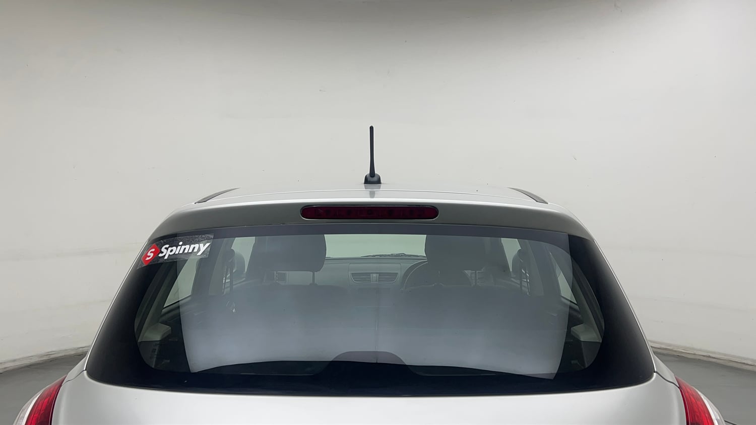 Used 2014 Maruti Suzuki Swift LXi Petrol Manual exterior BACK WINDSHIELD VIEW