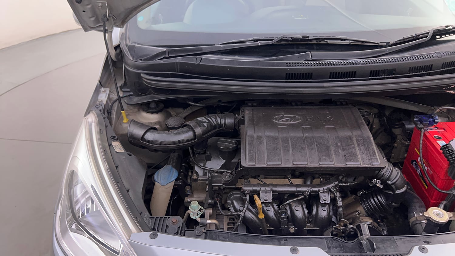 Used 2019 Hyundai Grand i10 Sportz 1.2 Kappa VTVT Petrol Manual engine ENGINE RIGHT SIDE HINGE & APRON VIEW