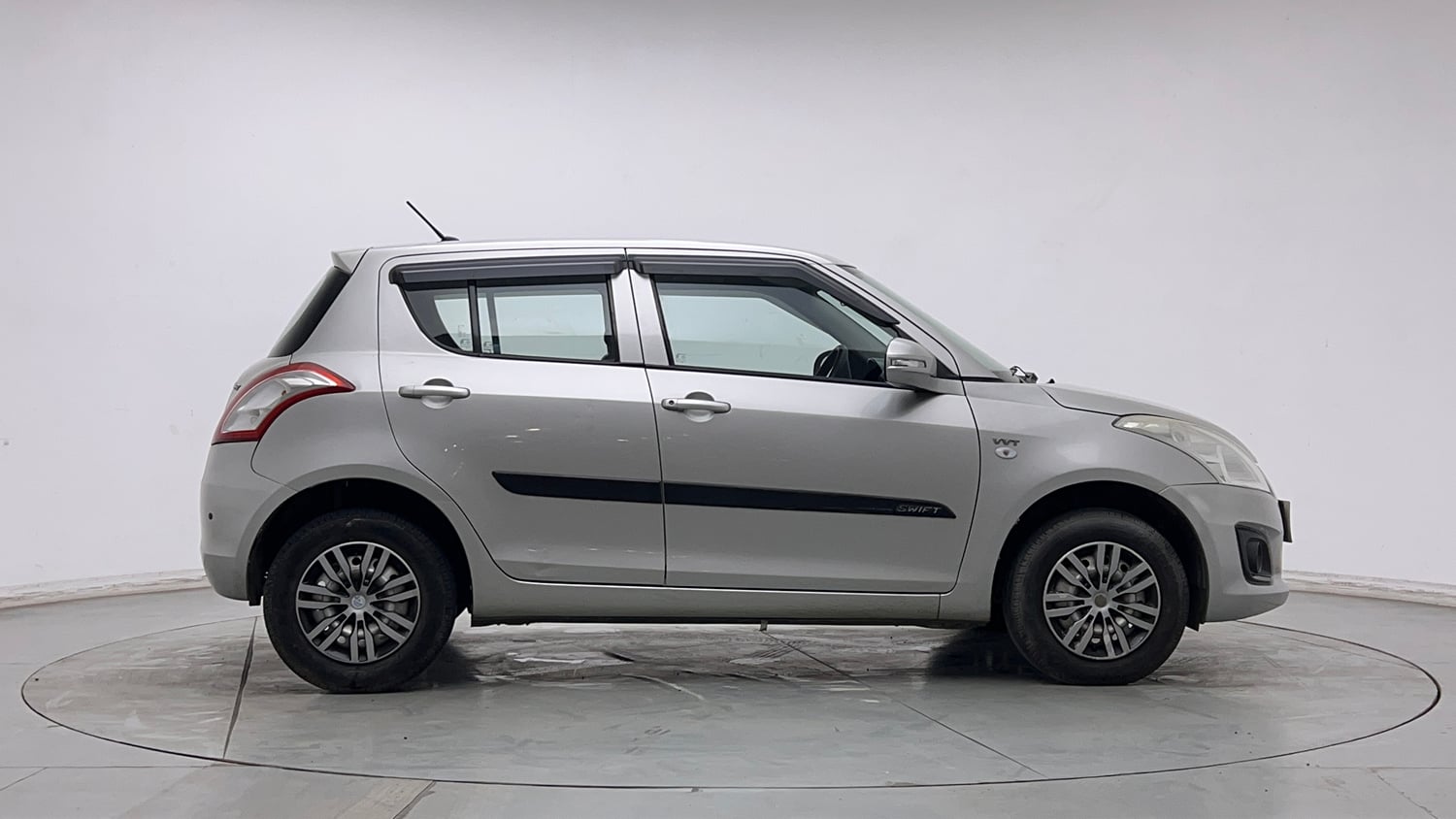 Used 2016 Maruti Suzuki Swift Lxi (O) Petrol Manual exterior RIGHT SIDE VIEW